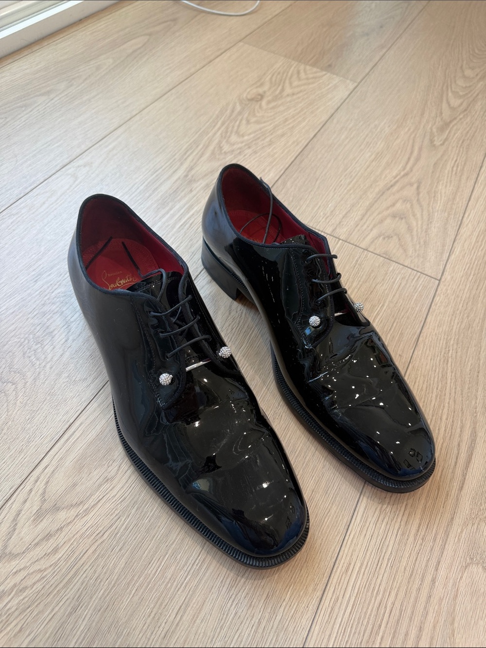 Christian Louboutin patent shoe